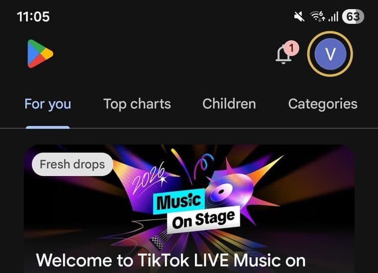 Play Store with the account picture in the top right circled in gold